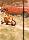 Jeremy on his big wheel.